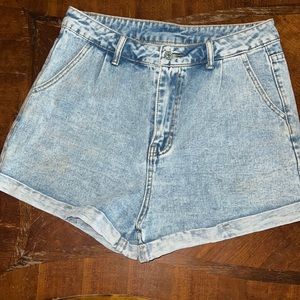Denim shorts size large light blue with cuffs.